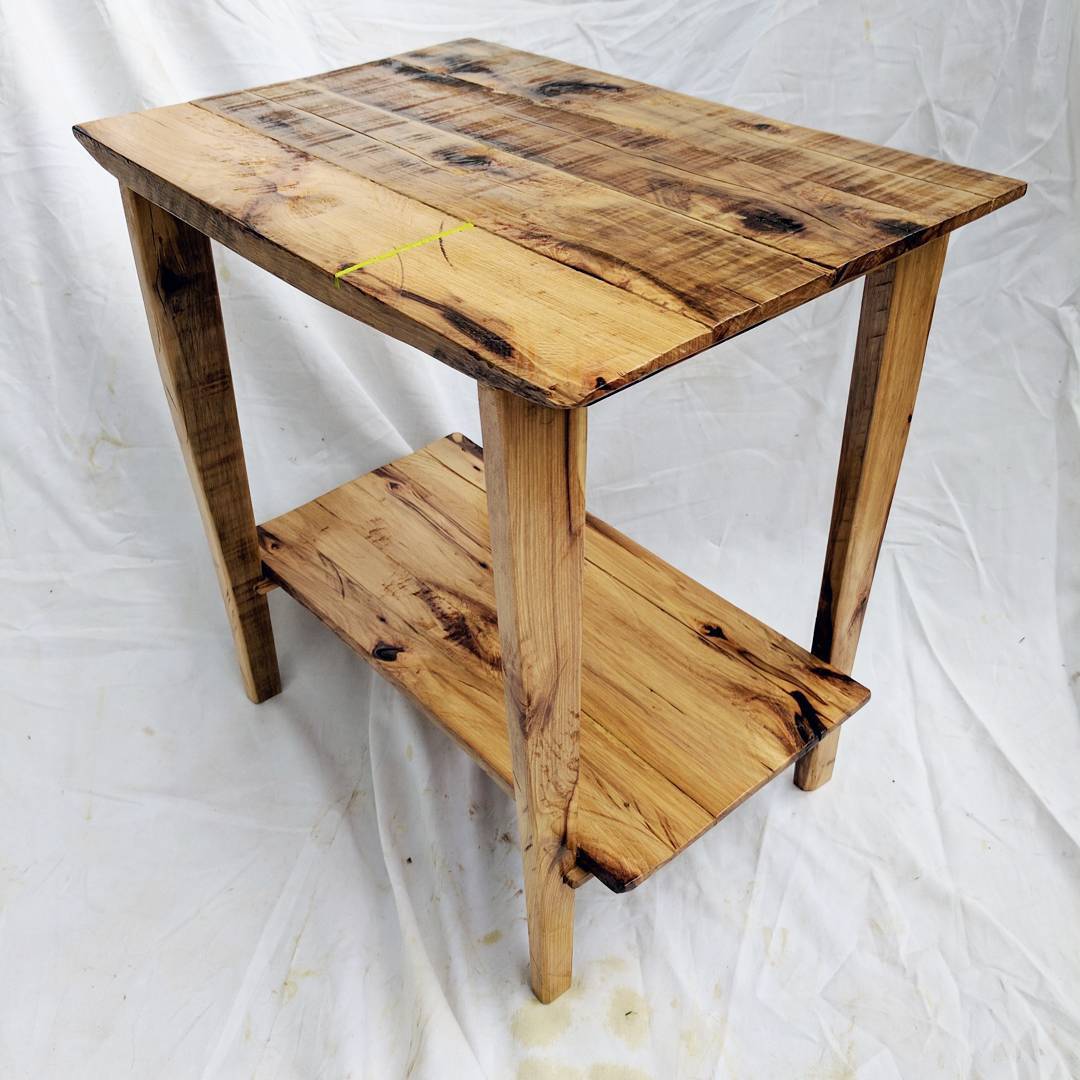A rustic-looking end table.